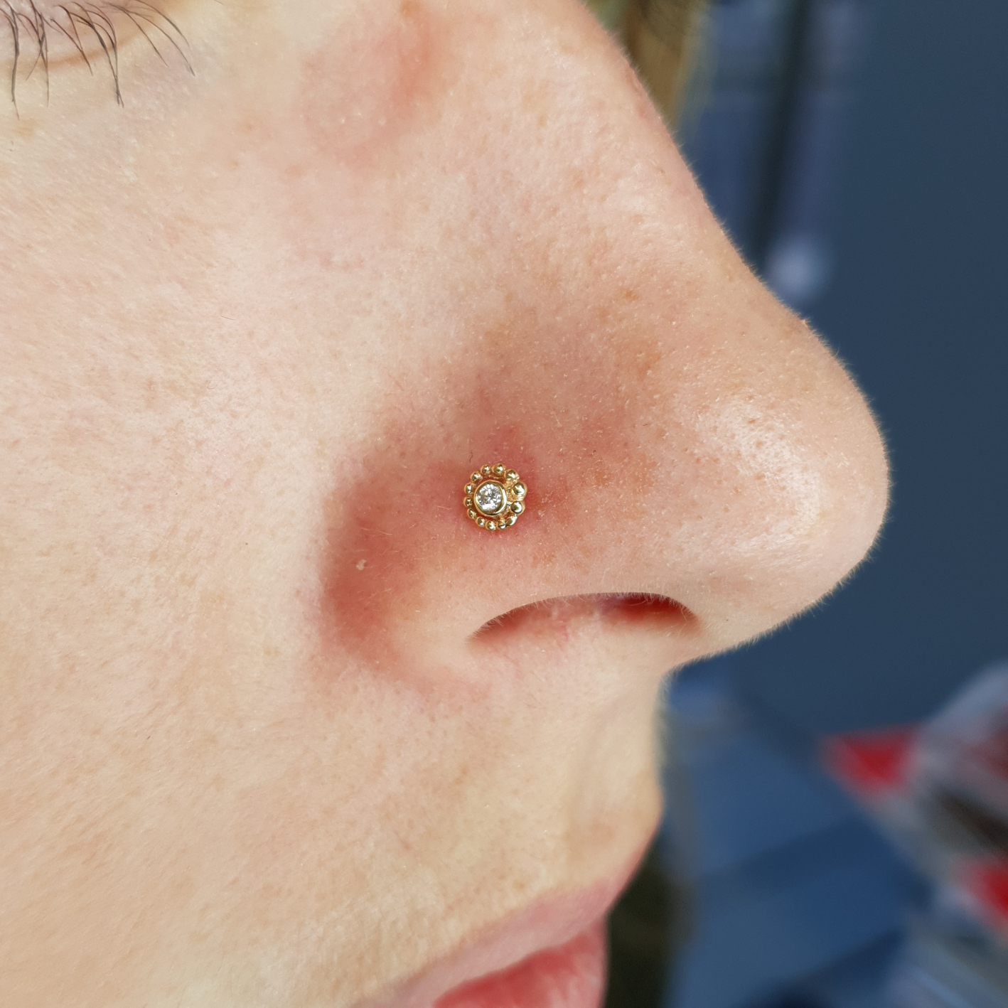 Nostril piercing with beaded swirl from BVLA