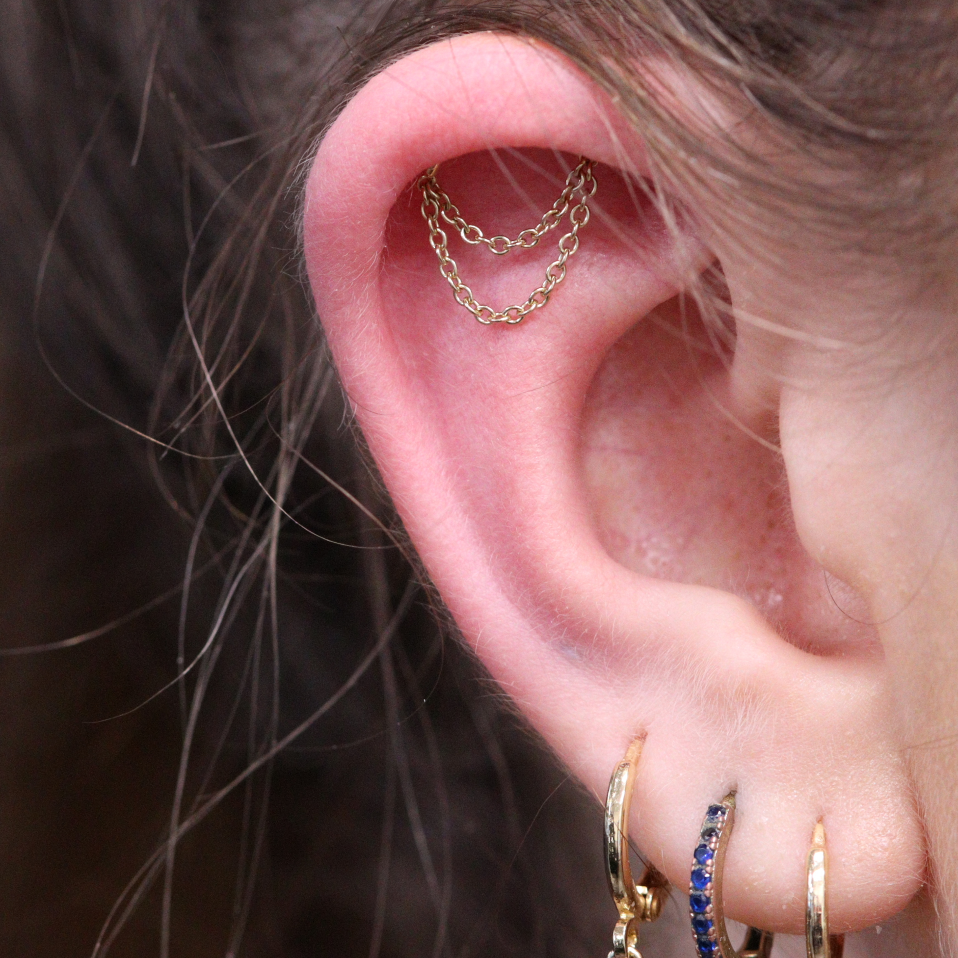 Hidden helix piercing with jewellery from Ixus fine jewellery