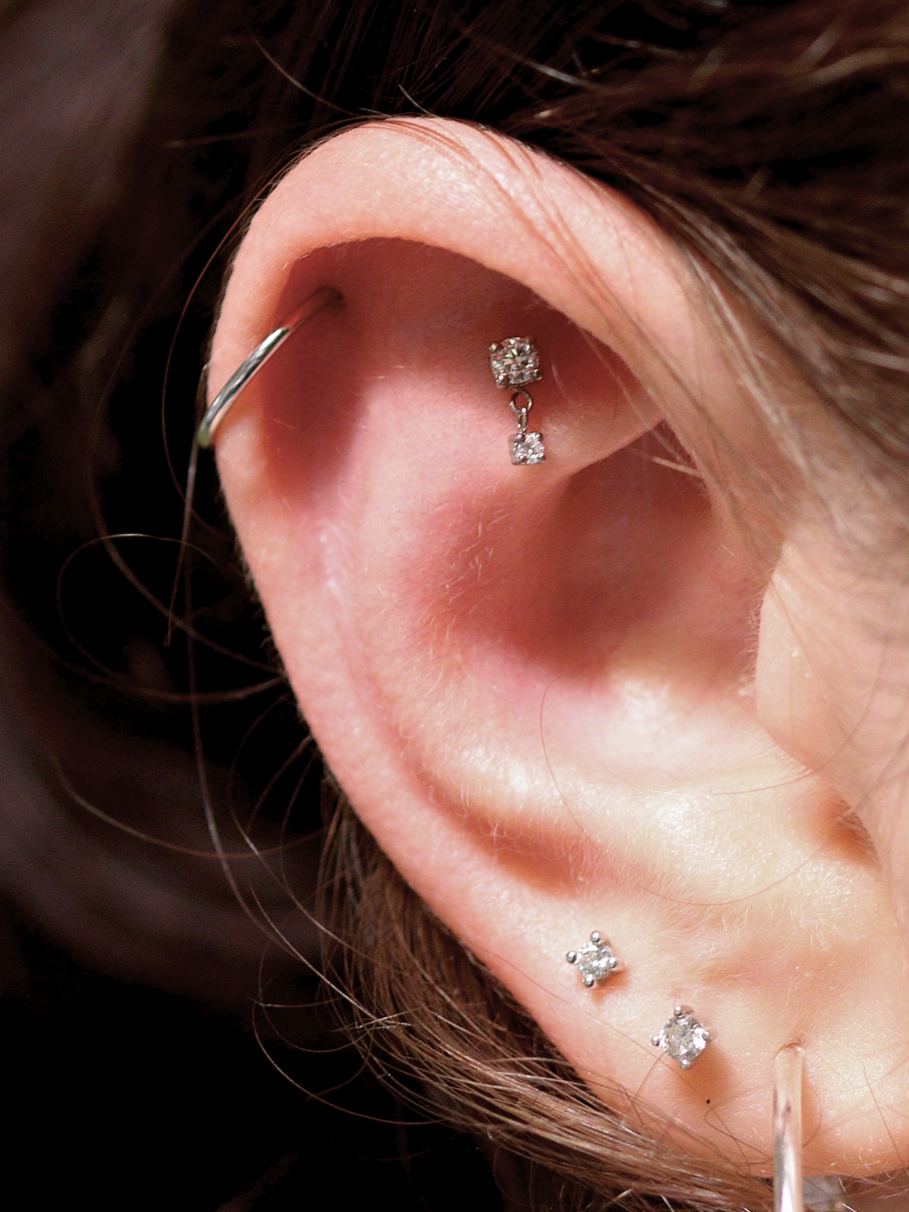 Faux rook piercing with The Final Wish from Ixus Fine Jewellery in 18k white gold with moissanite stones