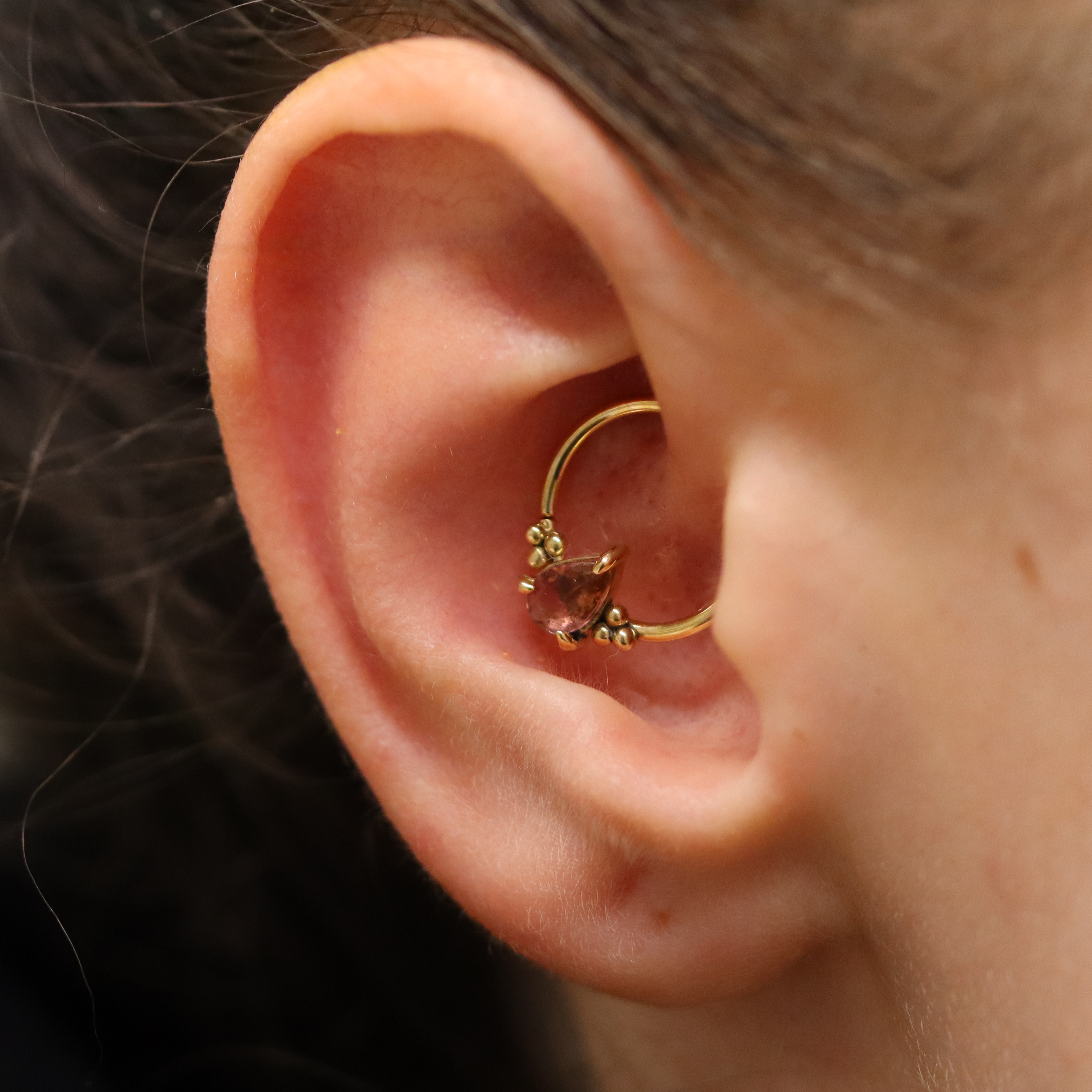 Daith piercing with bespoke ring from Ixus fine jewellery